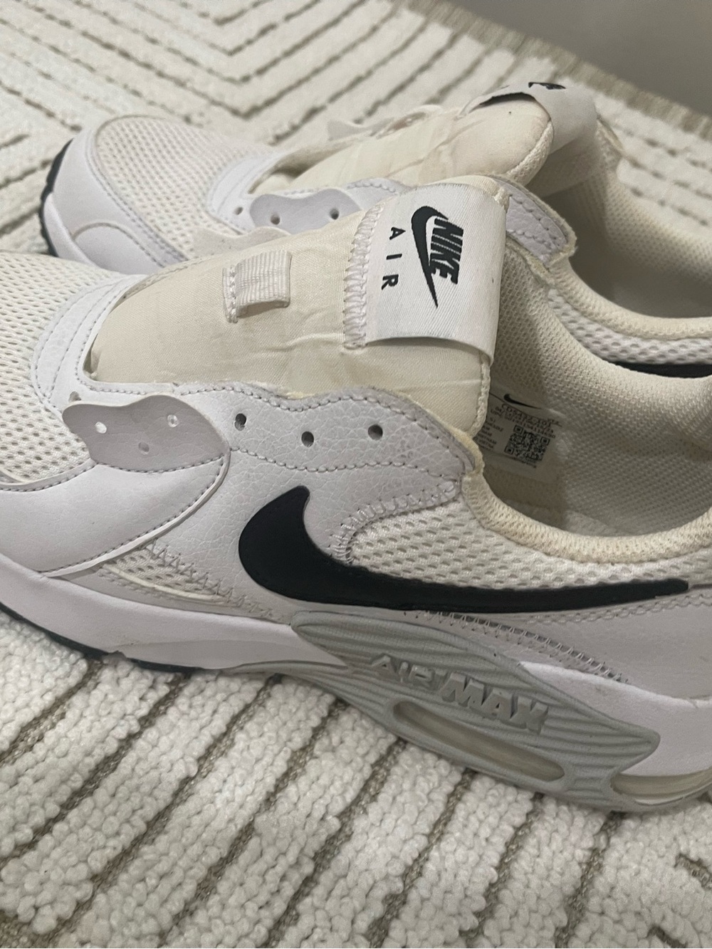Nike Kids White Sneakers with Black Swoosh